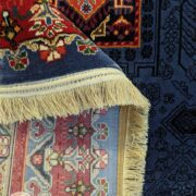 فرش طرح سنتی ماشینی دستباف گونه زمینه سرمه ای کد 103