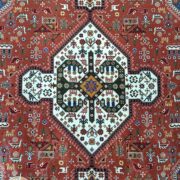 فرش ماشینی طرح سنتی و دستباف قشقایی زمینه لاکی (گلبهی) کد 112