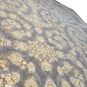 فرش ماشینی کلاسیک 1200 شانه گل برجسته زمینه طلا کوب فیلی طرح ارکیده